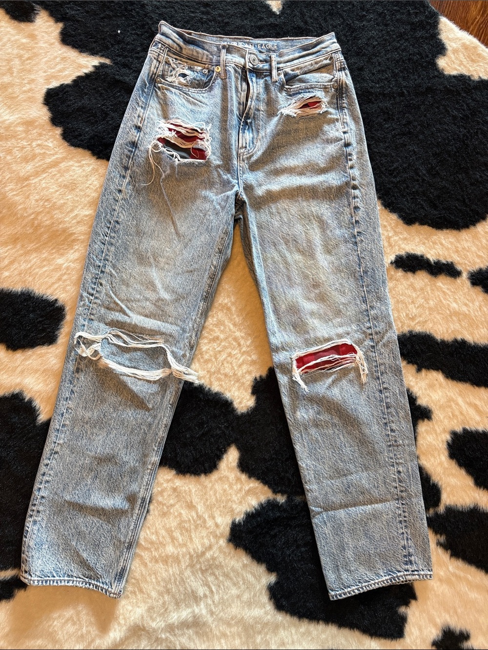 American Eagle Light Blue Distressed Jeans with Red Patch Details